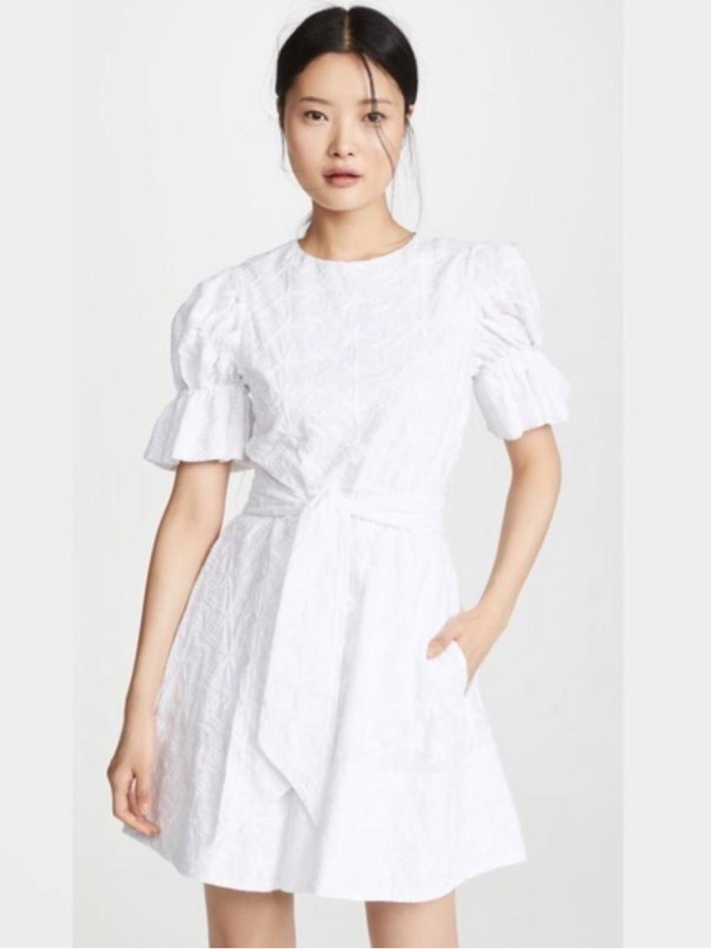Saloni Ciara dress features a white textured finish with a self-tie waist